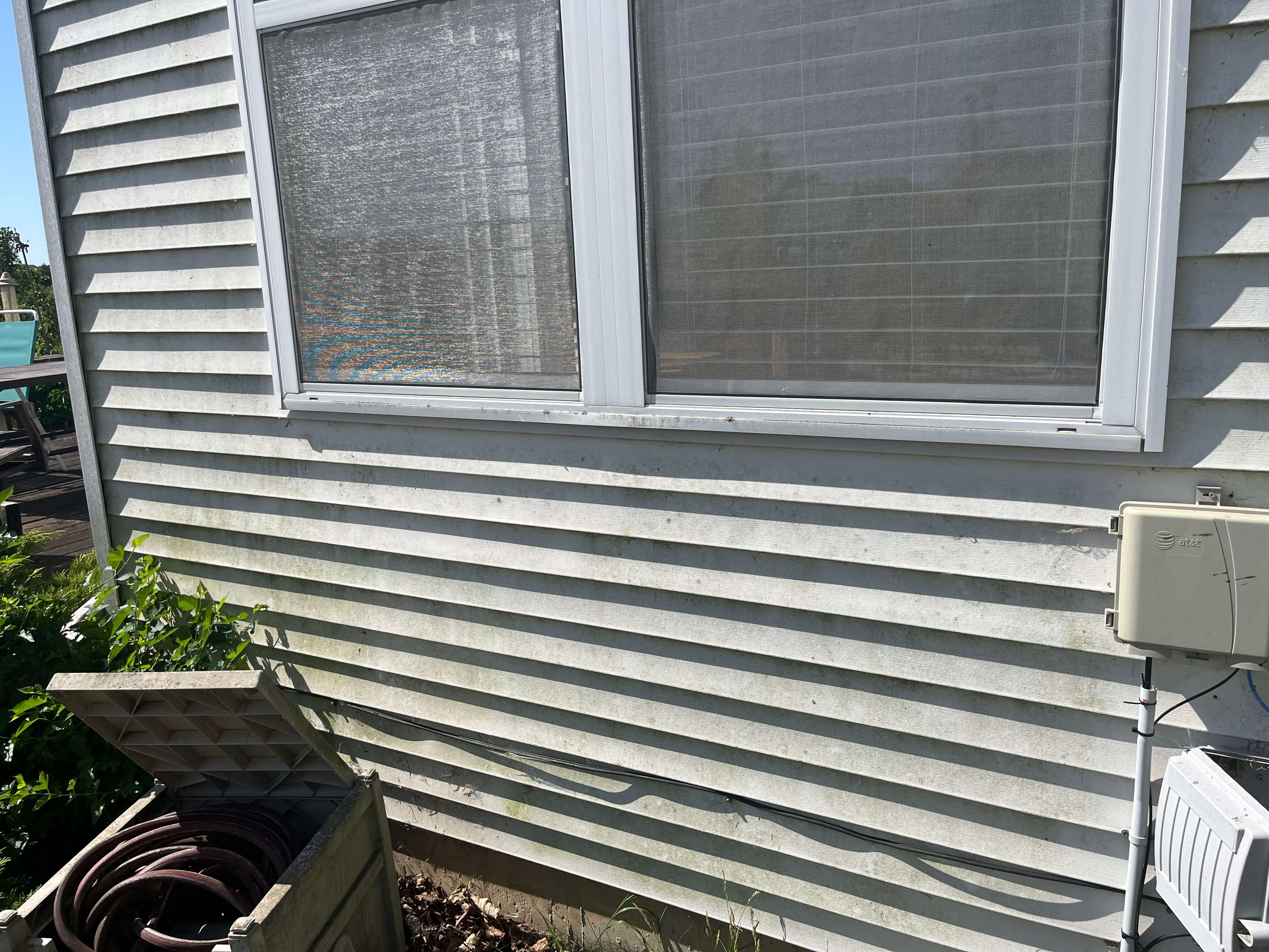Siding before cleaning